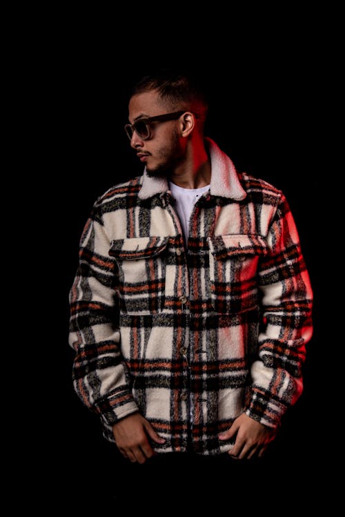 A Man in Plaid Jacket Wearing Sunglasses