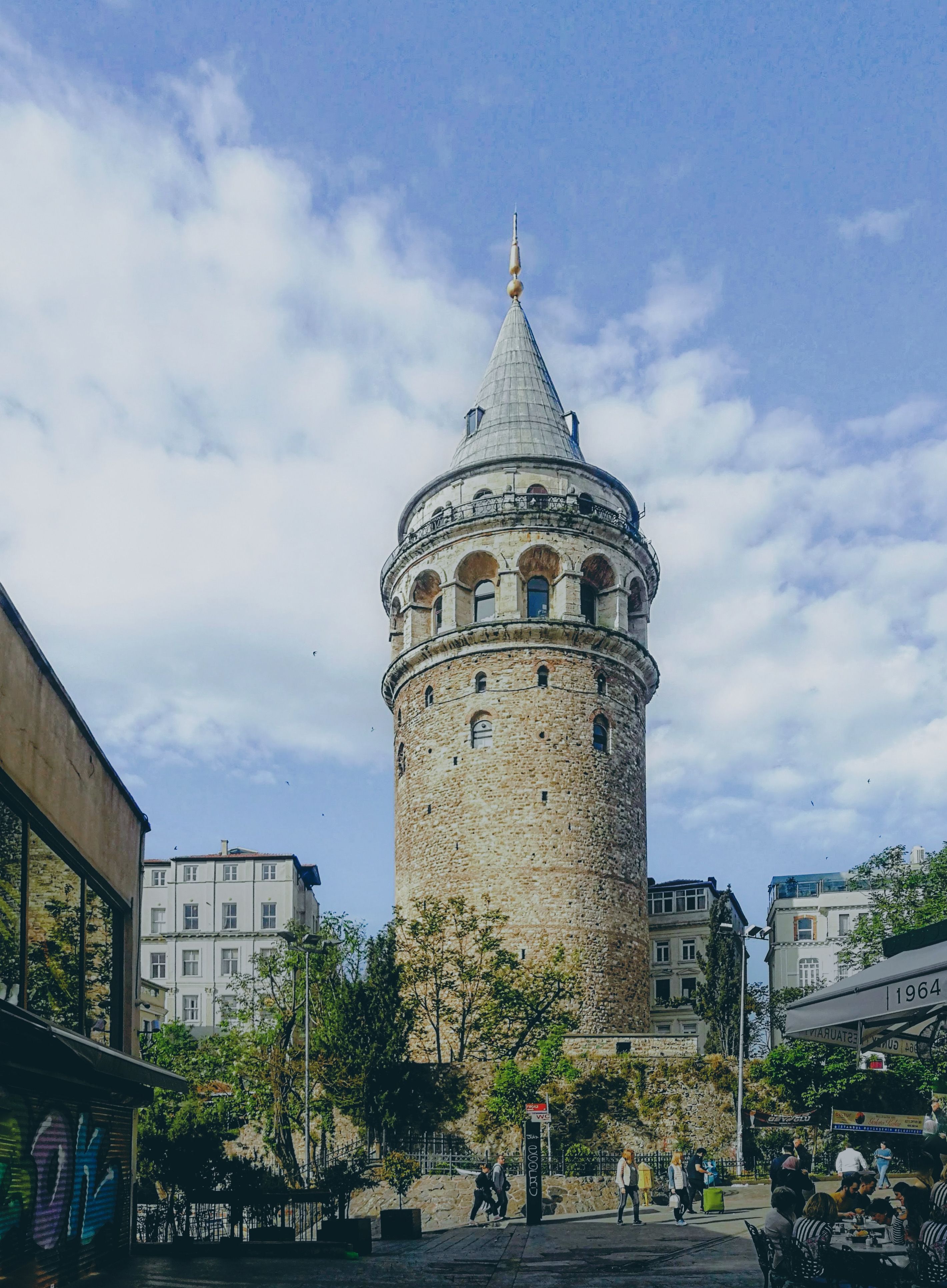 A Low Angle Shot of a Church Under the Blue Sky and White Clouds · Free ...