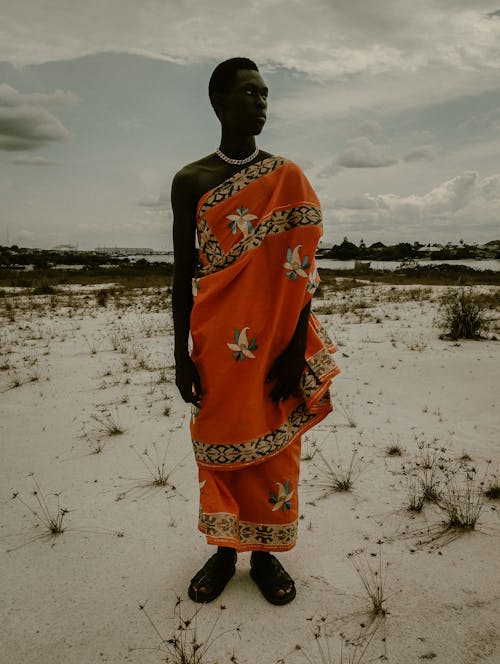 Man in Tribal Clothing on Desert