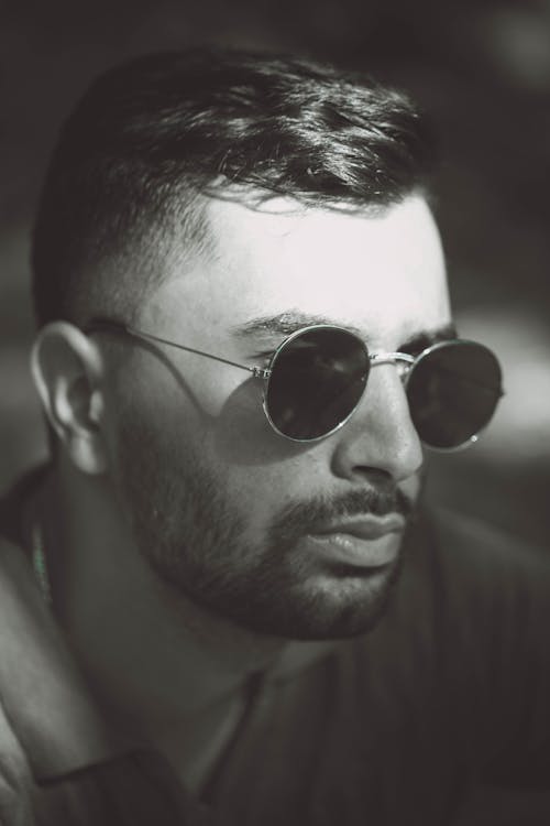 Grayscale Photography of Man Wearing Sunglasses