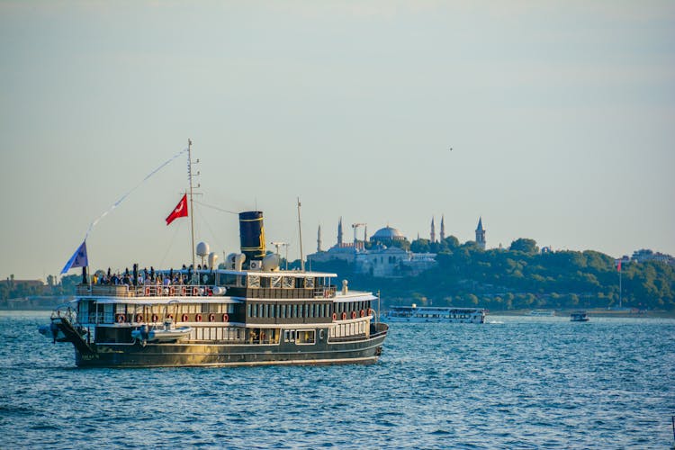 Tourist Ferry Sailing On Bay