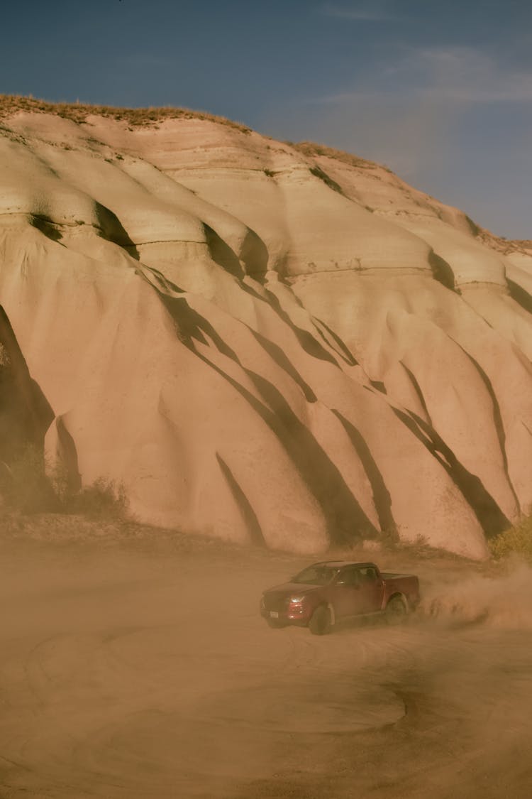 Car Running On The Desert