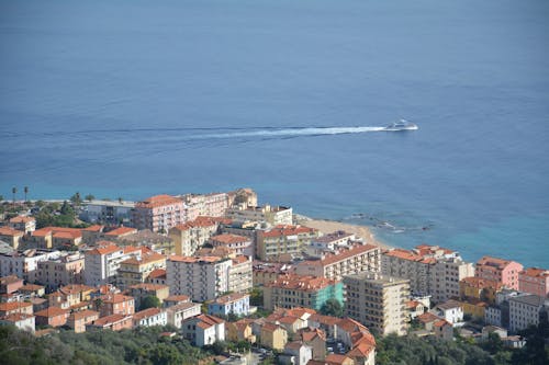 Aerial Photography of Buildings Near Sea