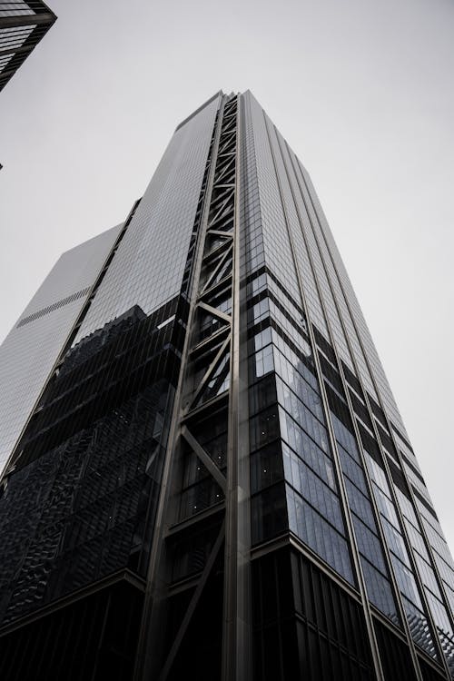 Modern High Rise Building Under White Sky