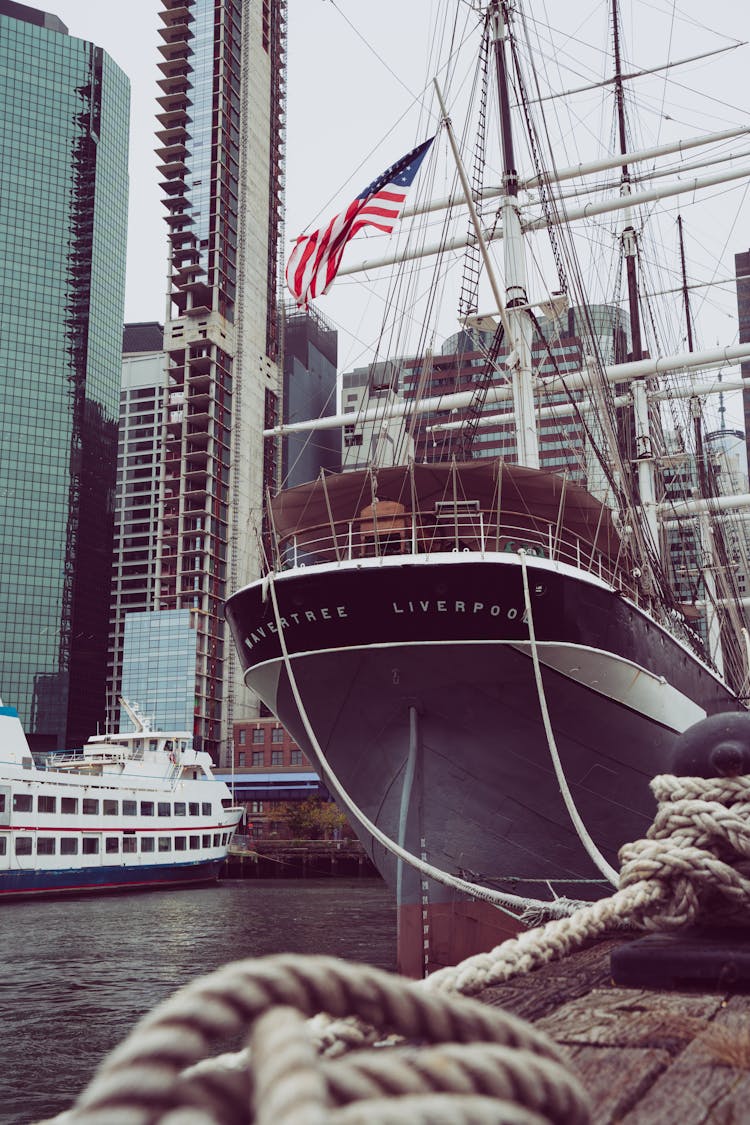 USA Flag On Ship In Harbor