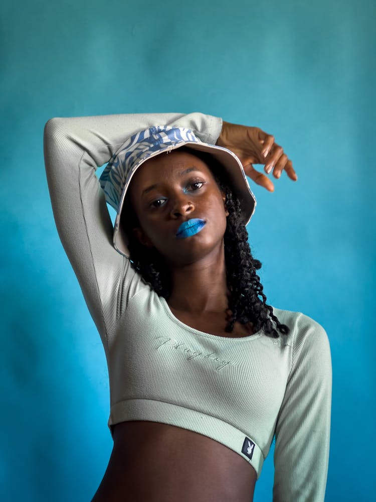 Portrait Of Girl On Blue Background