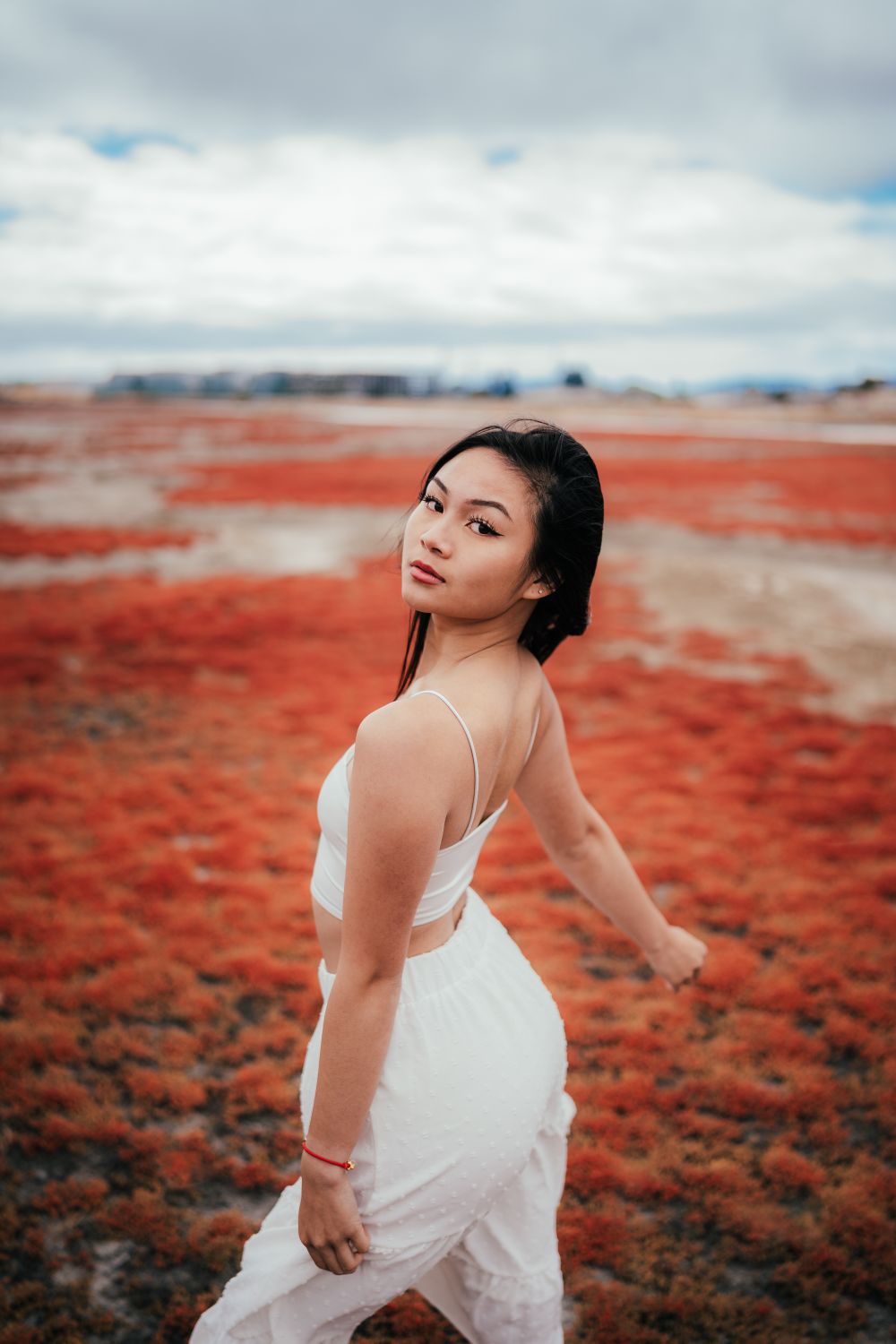 Portrait of a Woman Standing in a Field · Free Stock Photo