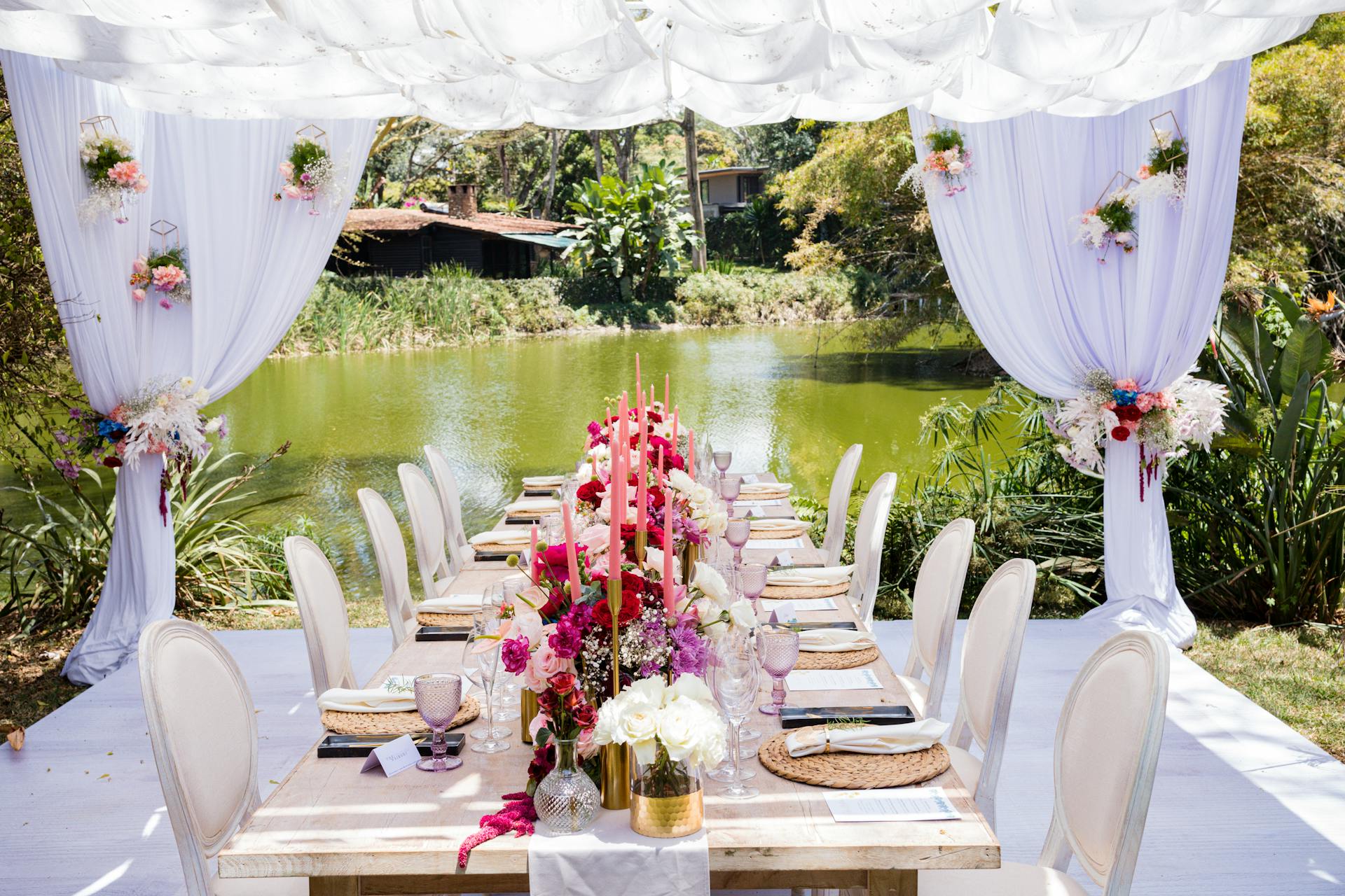 Brown Wooden Chairs Near Body of Water