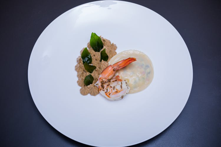 Gourmet Prawn Based Dish On White Plate