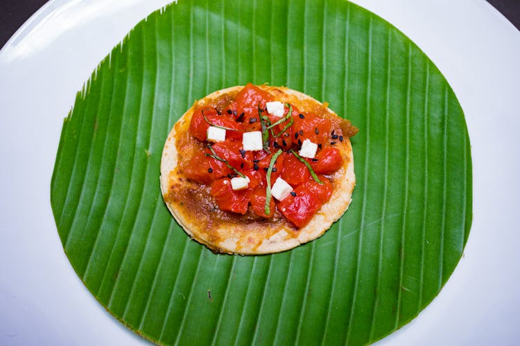 Pizza On Green Banana Leaf