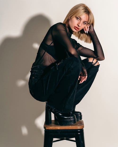 Woman Crouching on a Stool