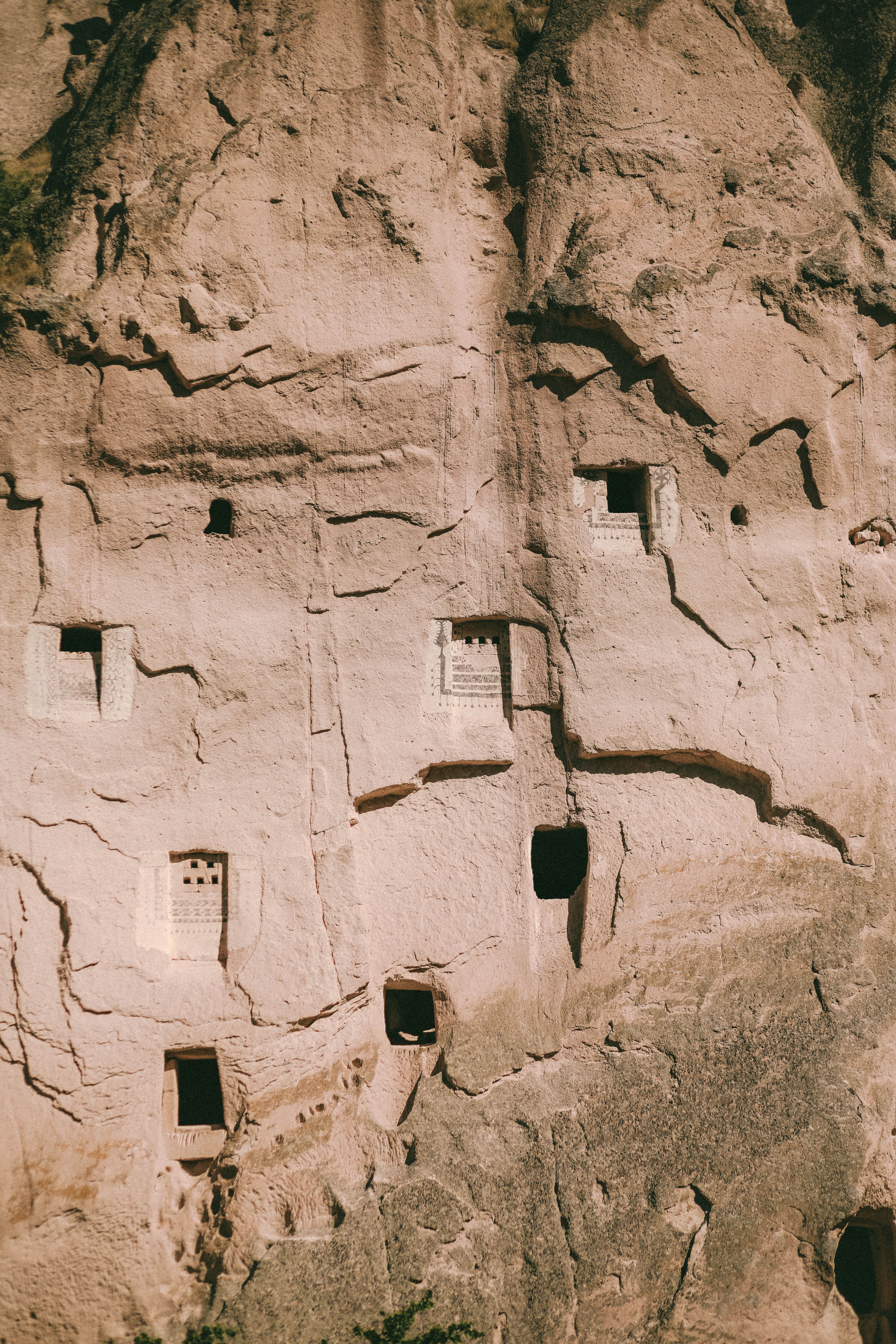 Explore the intriguing rock-cut cave dwellings of Cappadocia, showcasing historic architecture.