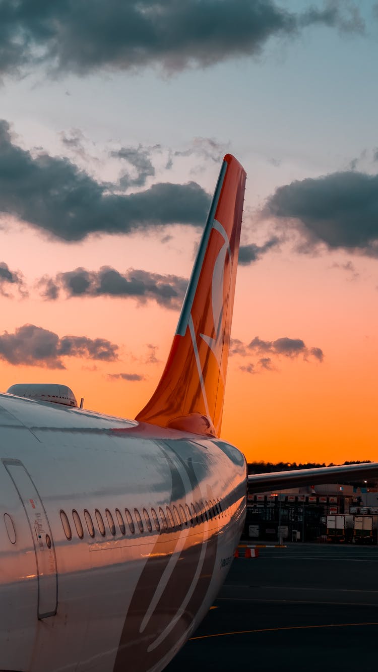 An Airplane At Sunset 