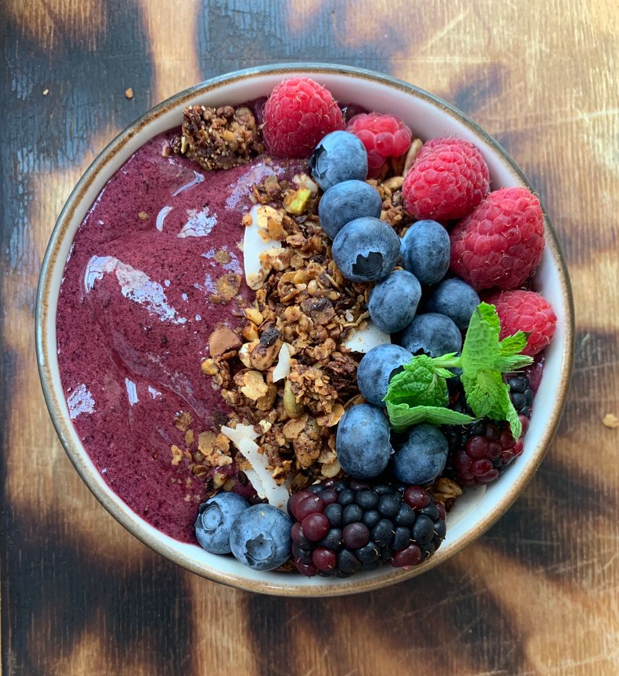 Acai bowl with fresh berries and granola