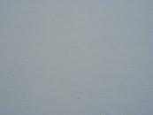 Close-up Shot of White Wall