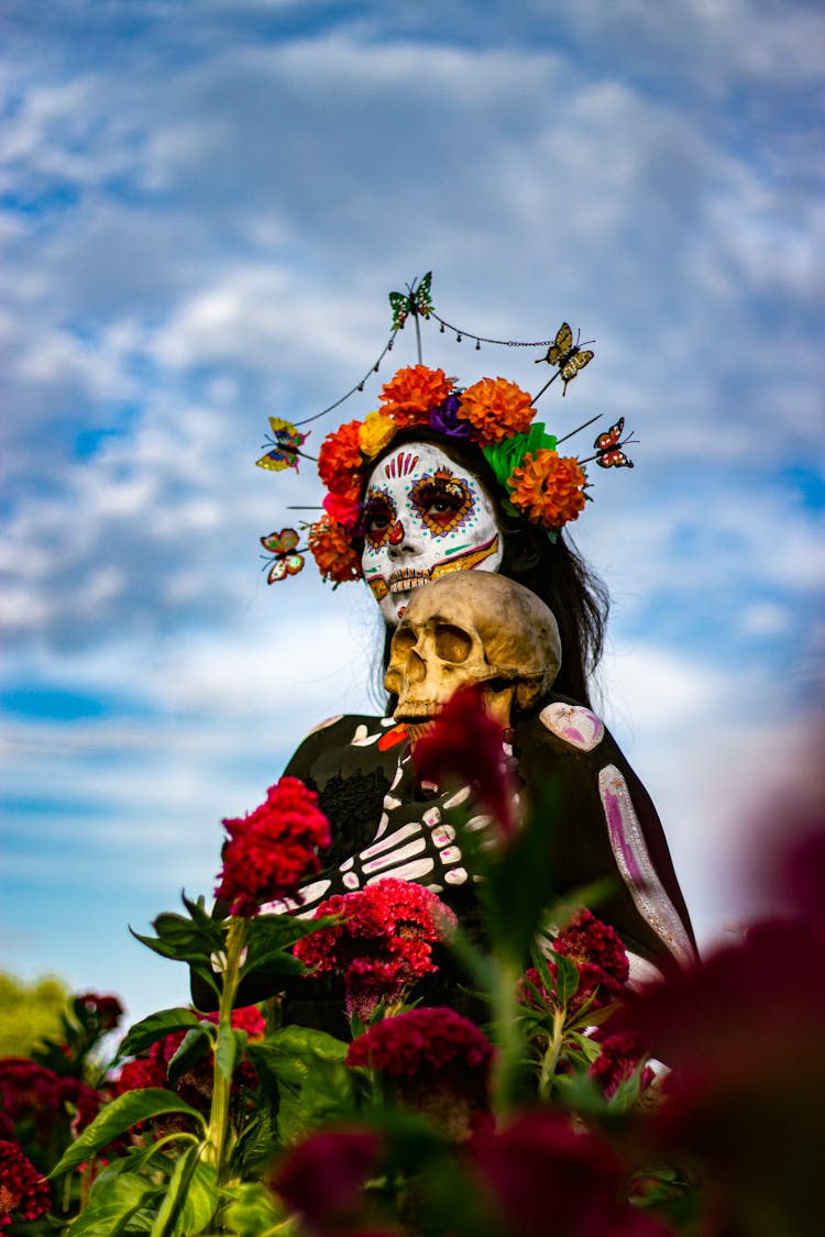 A Catrina Holding A Skull