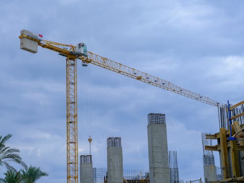 Free Yellow Crane on a Construction Site Stock Photo