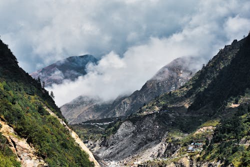 Aerial Photography of Mountains under the Cloudy Sky