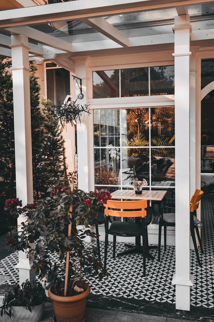 Cafe Terrace With Tiled Floor And Plants