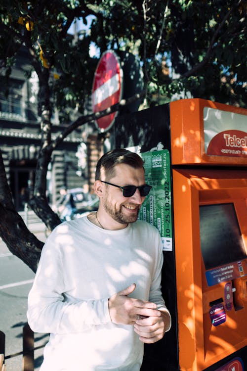 Smiling Man in Sunglasses