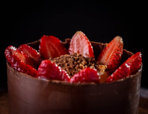 Close-up Shot of Chocolate Cake with Strawberry Toppings