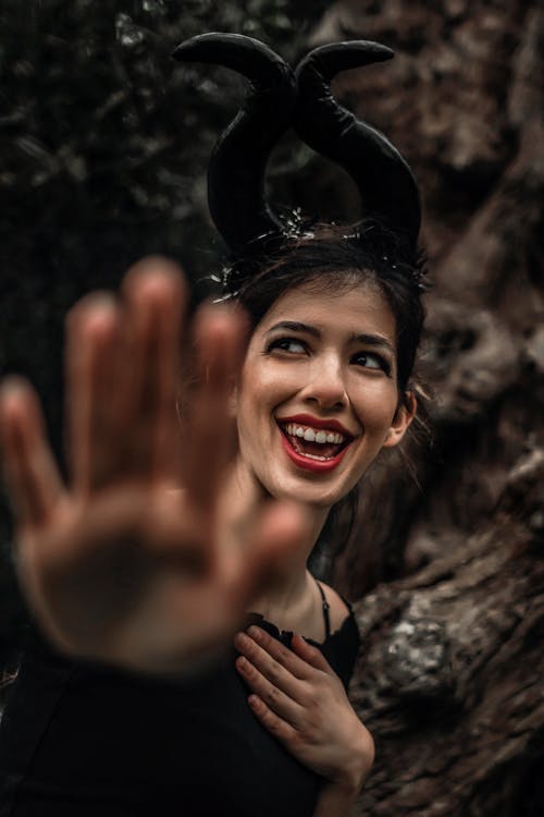 Woman in Devil Horns for Halloween