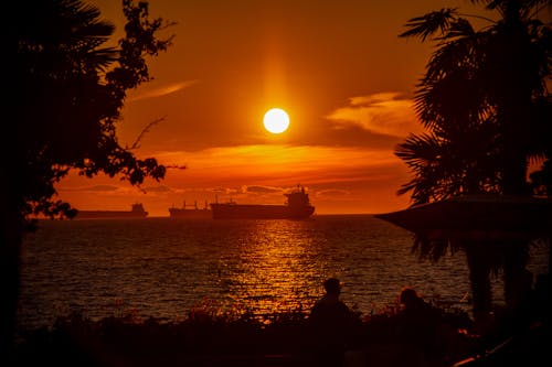 Free Ship on Body of Water during Sunset Stock Photo