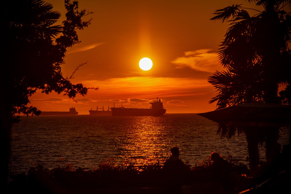 Ship on Body of Water during Sunset