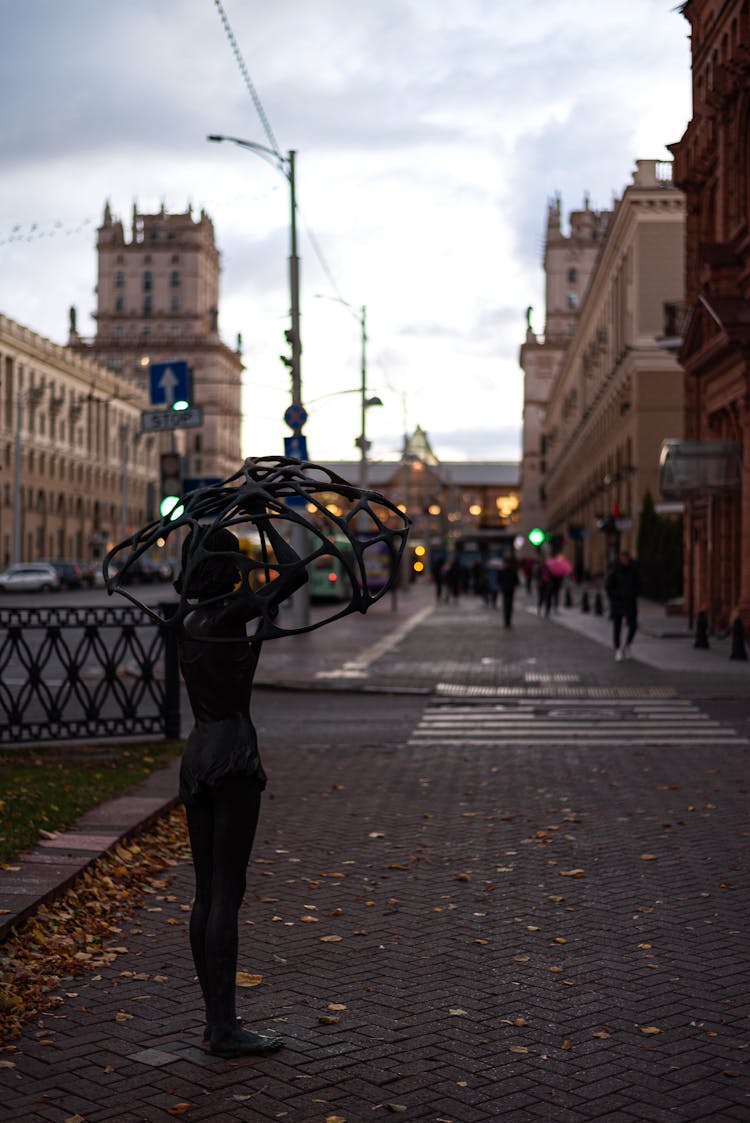 A Sidewalk In A City 