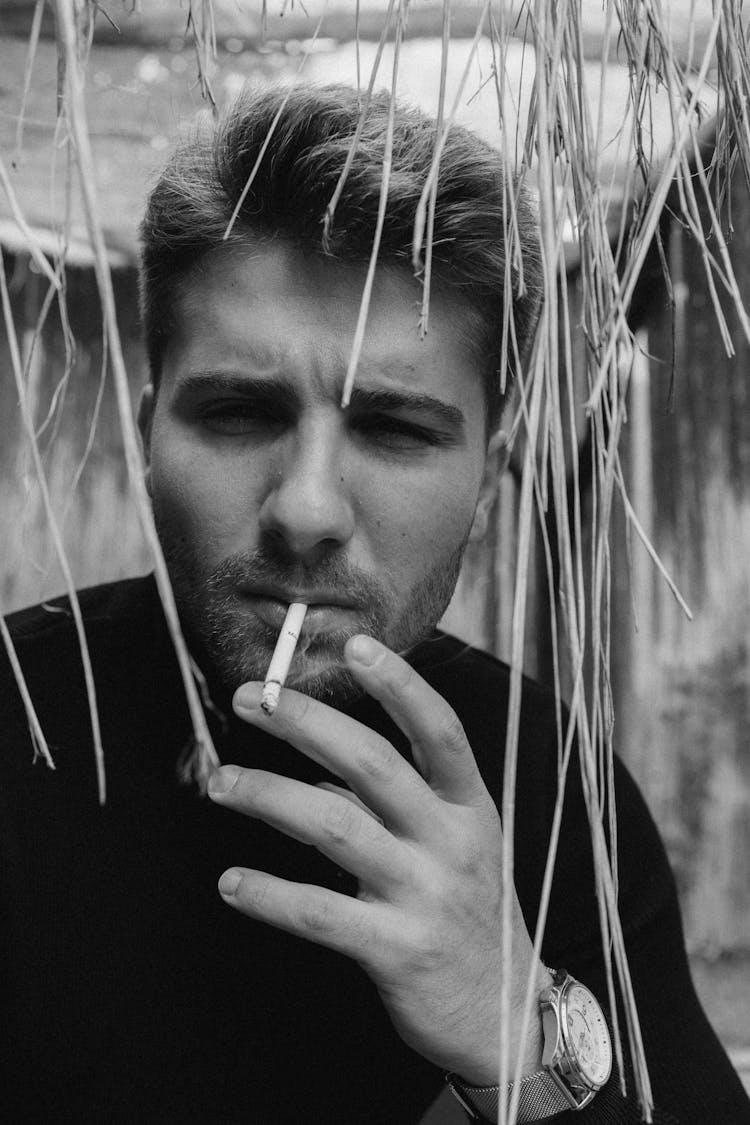 Close-Up Shot Of A Man Smoking