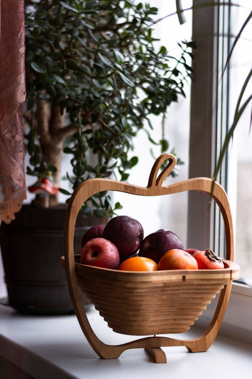 Foto profissional grátis de cesto de frutas, frutas, maçãs