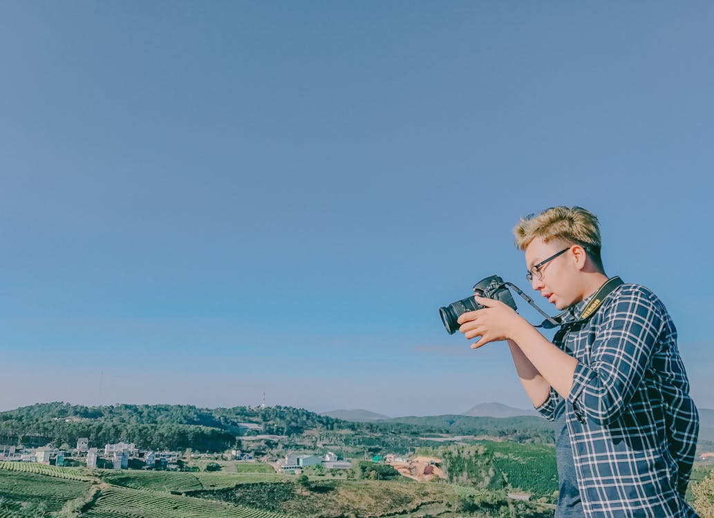 Man Uses Nikon Dslr Camera