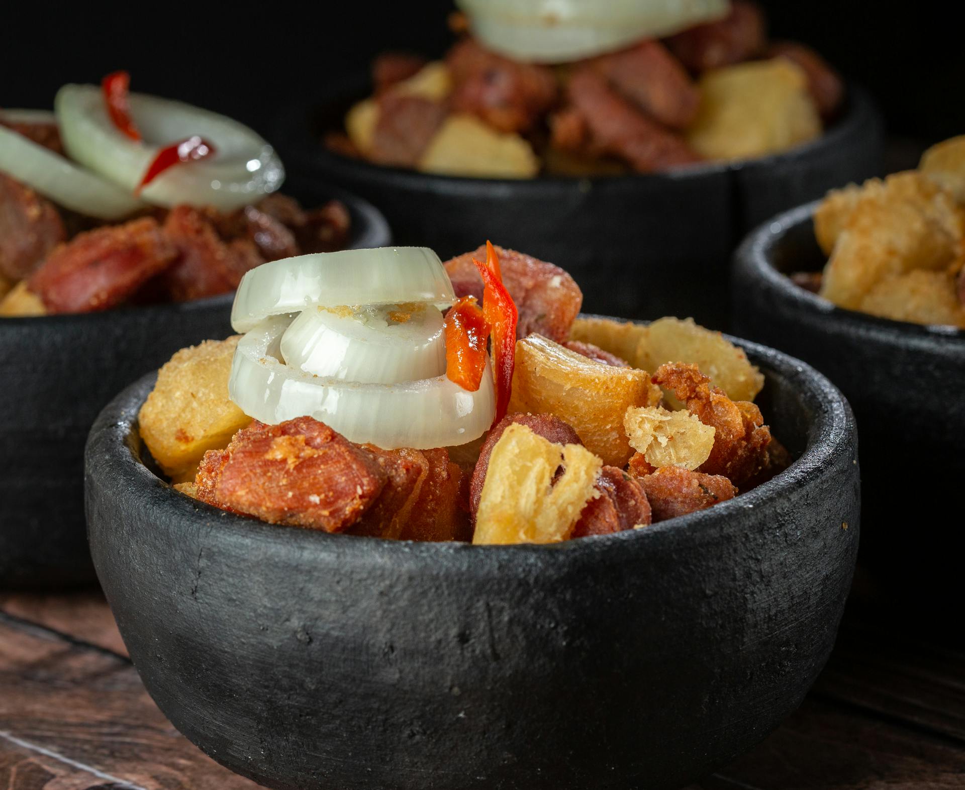 Cooked Food on Black Ceramic Bowl