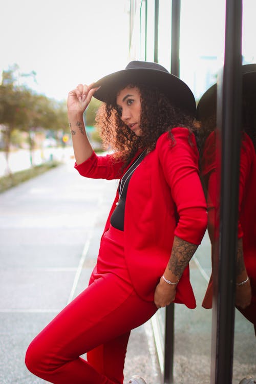 Woman in Red Coat and Black Hat 