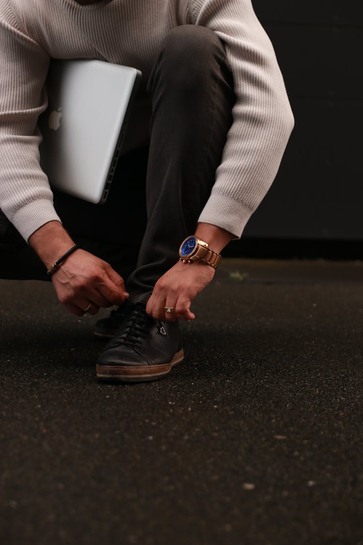 Man Tying His Shoelace