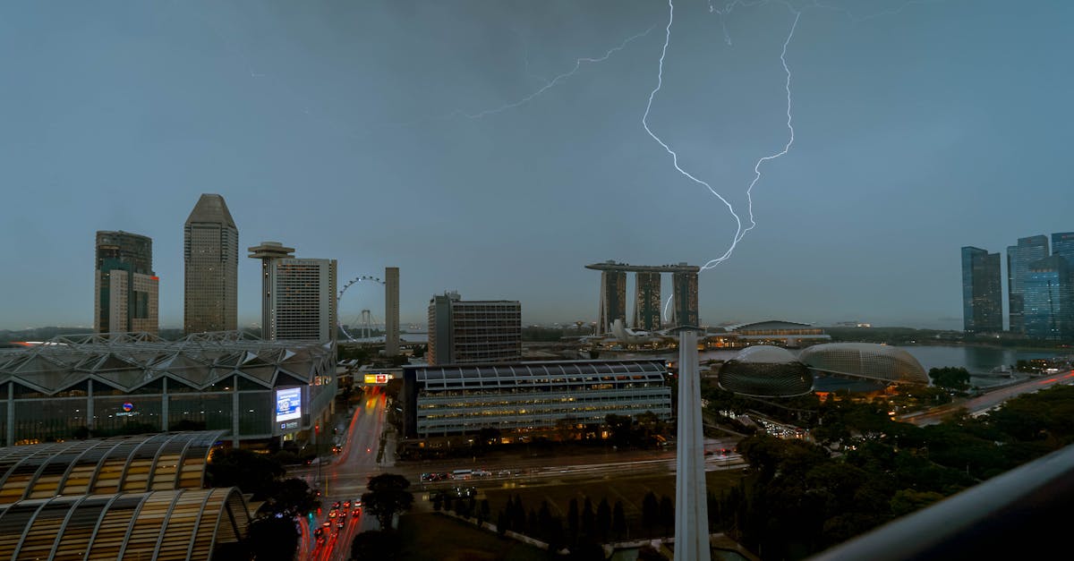 Captivating view of lightning striking above the iconic skyline of Singapore.