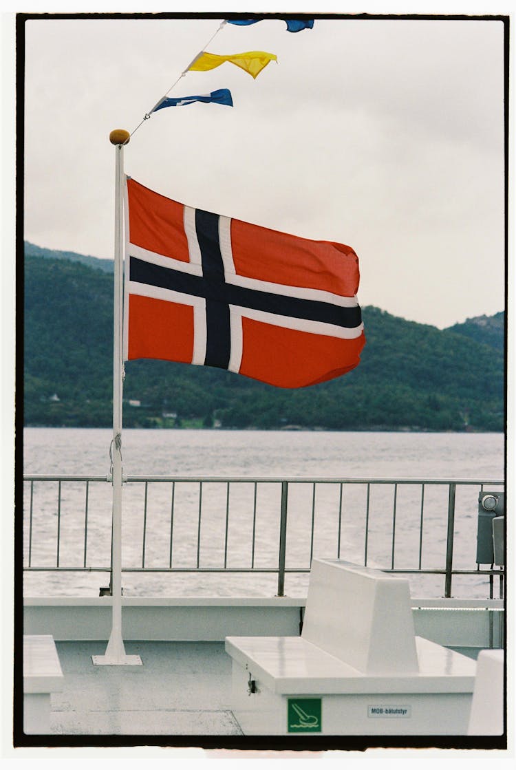 Norway Flag On Deck Near Water