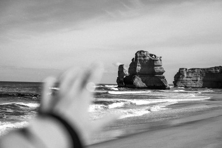 Grayscale Photo Of Rock Formation Of The Twelve Apostles In Melbourne, Australia