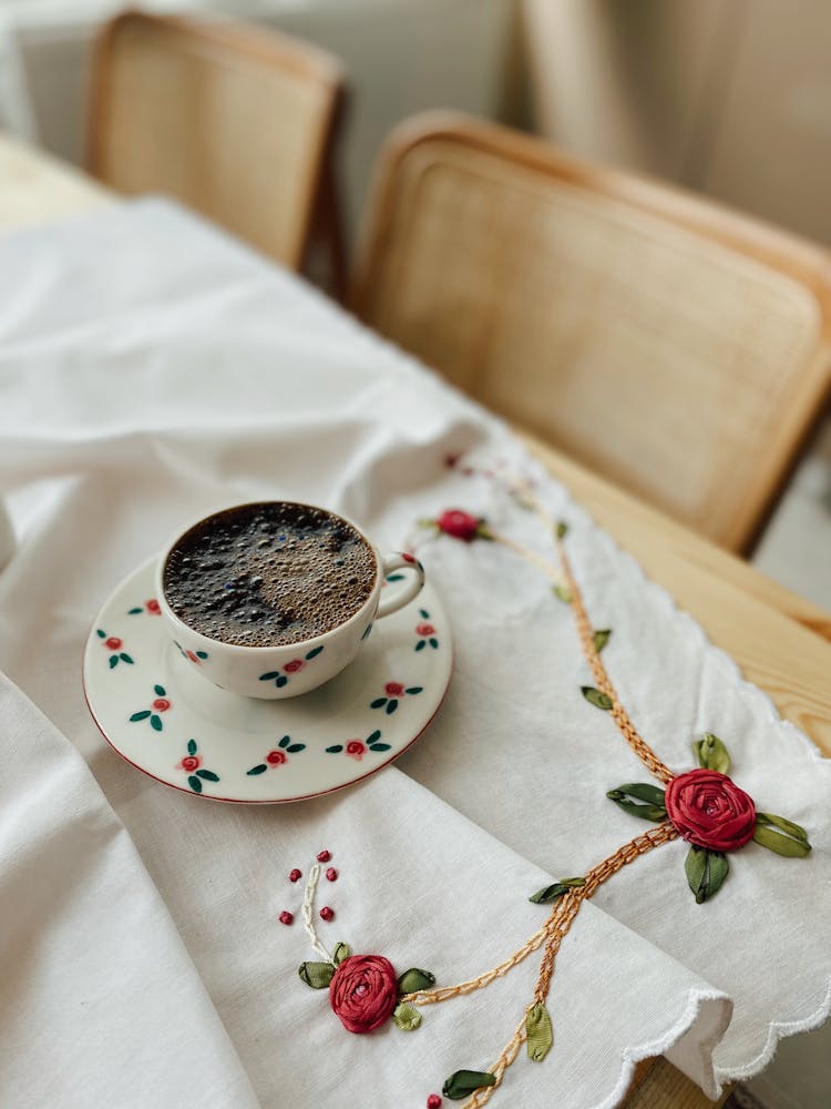 A Cup Of Coffee On The Table