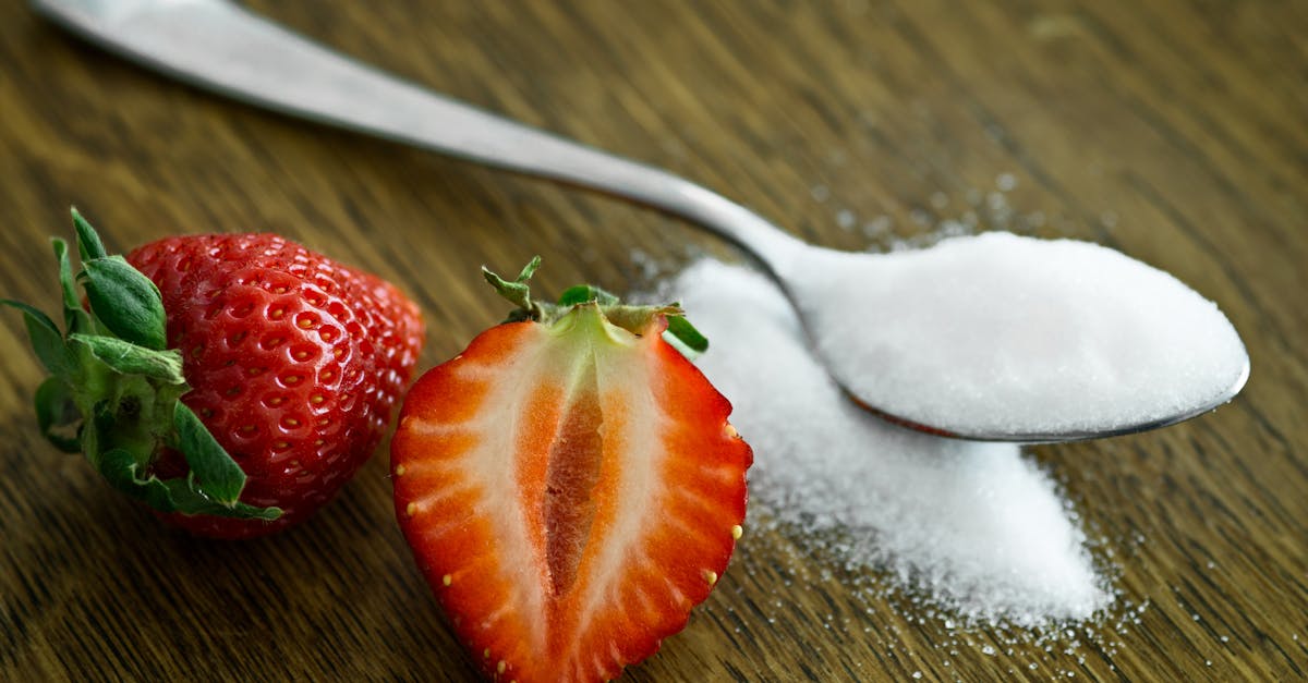 Strawberry Beside Spoon of Sugar