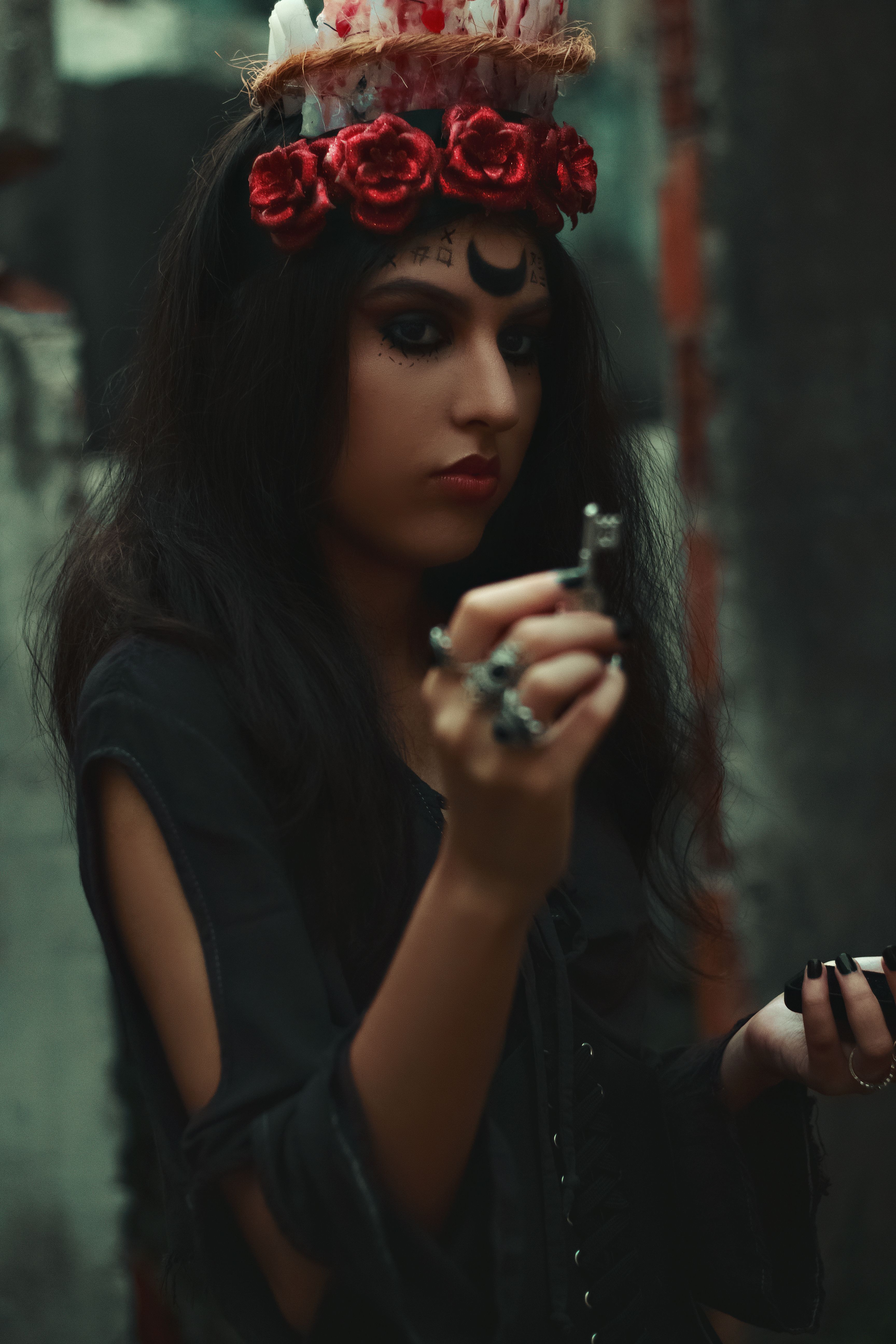 Woman Wearing a Flower Headdress Holding a Key · Free Stock Photo