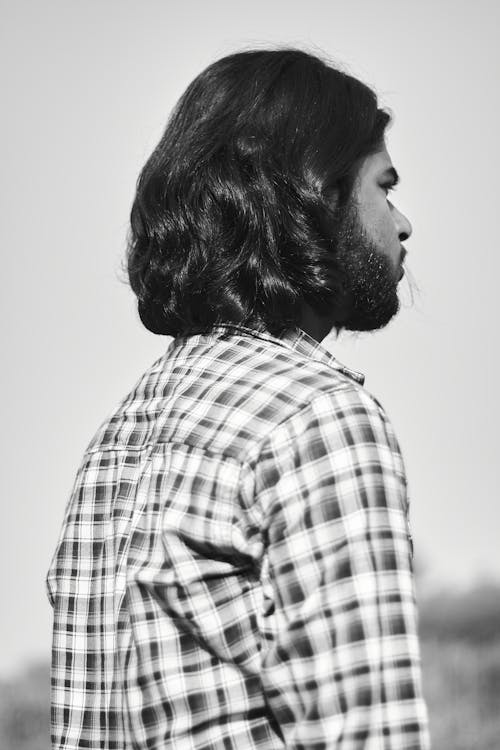 Monochrome Photograph of a Man with a Beard