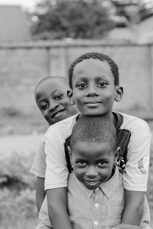 Grayscale Photo of Boys 