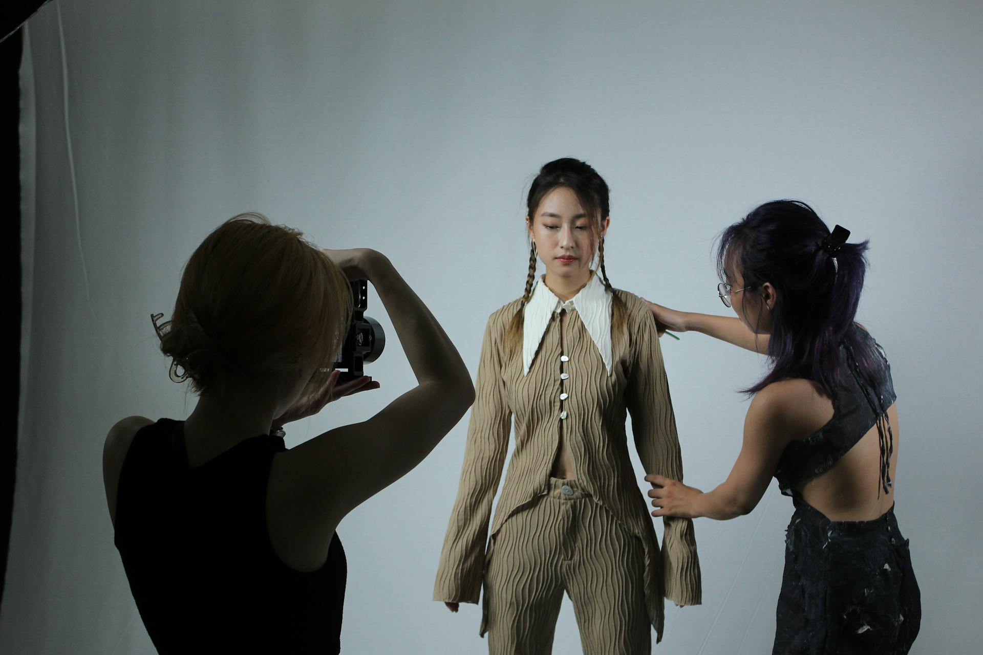 Women Preparing for Photo Session