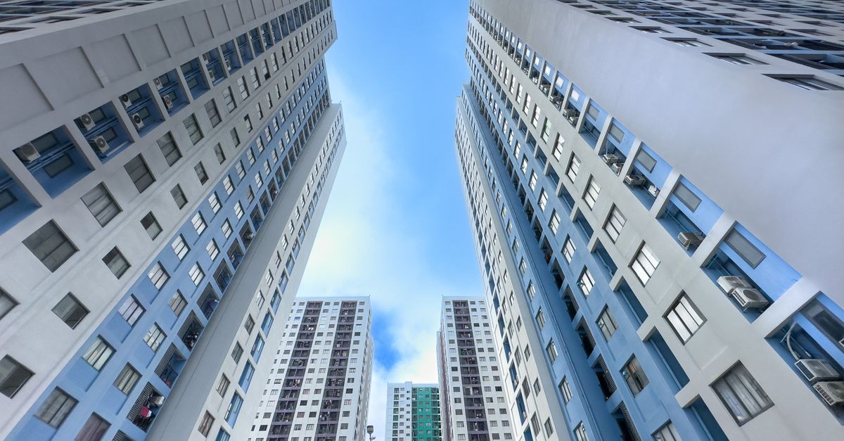 High Rise And Low Rise Building Low Angle Shot of High Rise Buildings · Free Stock Photo