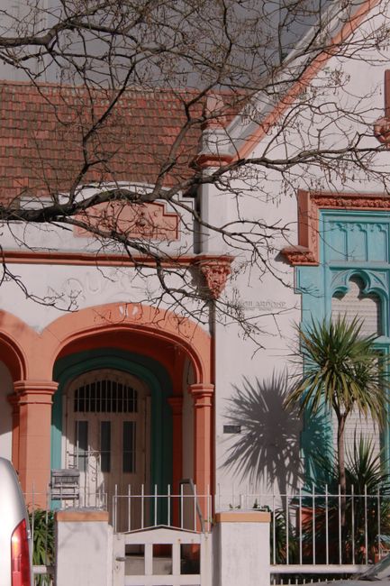 Photo by Catalina Chiaravalle on Pexels Charming urban building facade with unique arched design and vibrant colors. Perfect for architecture enthusiasts.