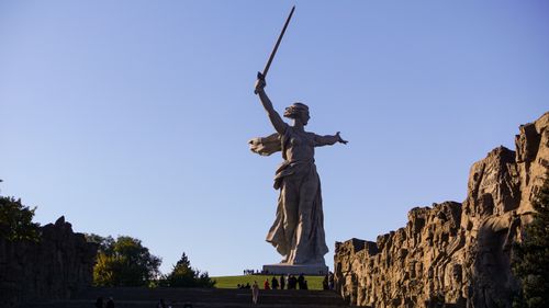 Free Statue of the Motherland Calls with sword under a clear sky in Russia. Stock Photo