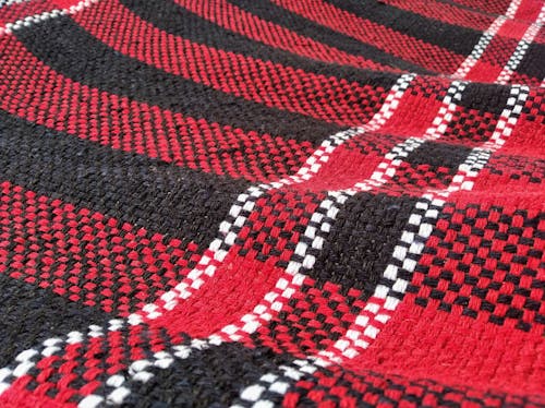 Closeup of Red and Black Striped Woven Fabric