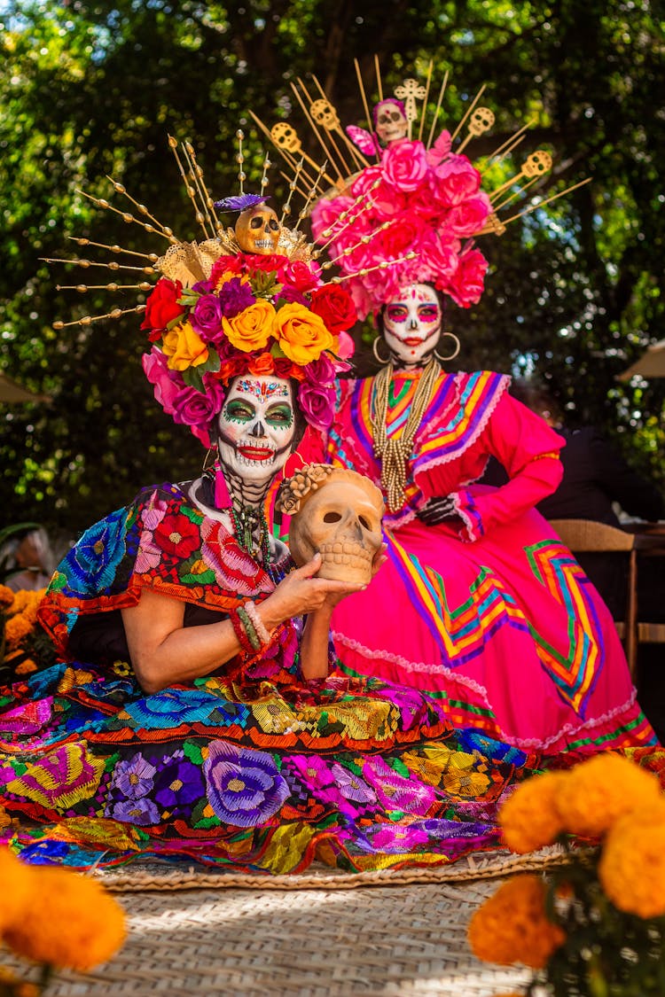 Women With Face Paint Wearing Traditional Clothing