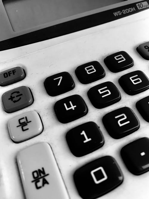 Free stock photo of black and white, calculator, close up shot